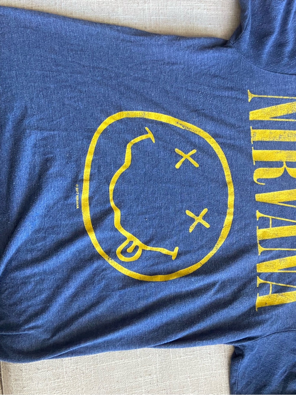 NIRVANA Blue Short Sleeve Tee with Yellow Smiley Graphic